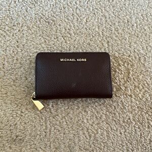 Micheal Kors “Small Pebbled Leather Wallet”